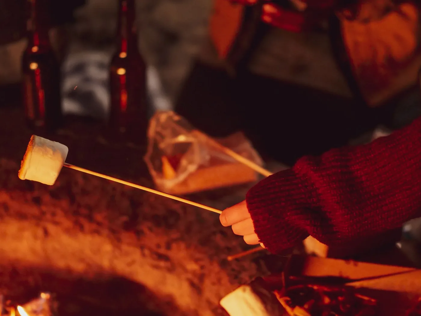 Marshmallows roasted on sticks over geothermal heat in the Pacaya lava field