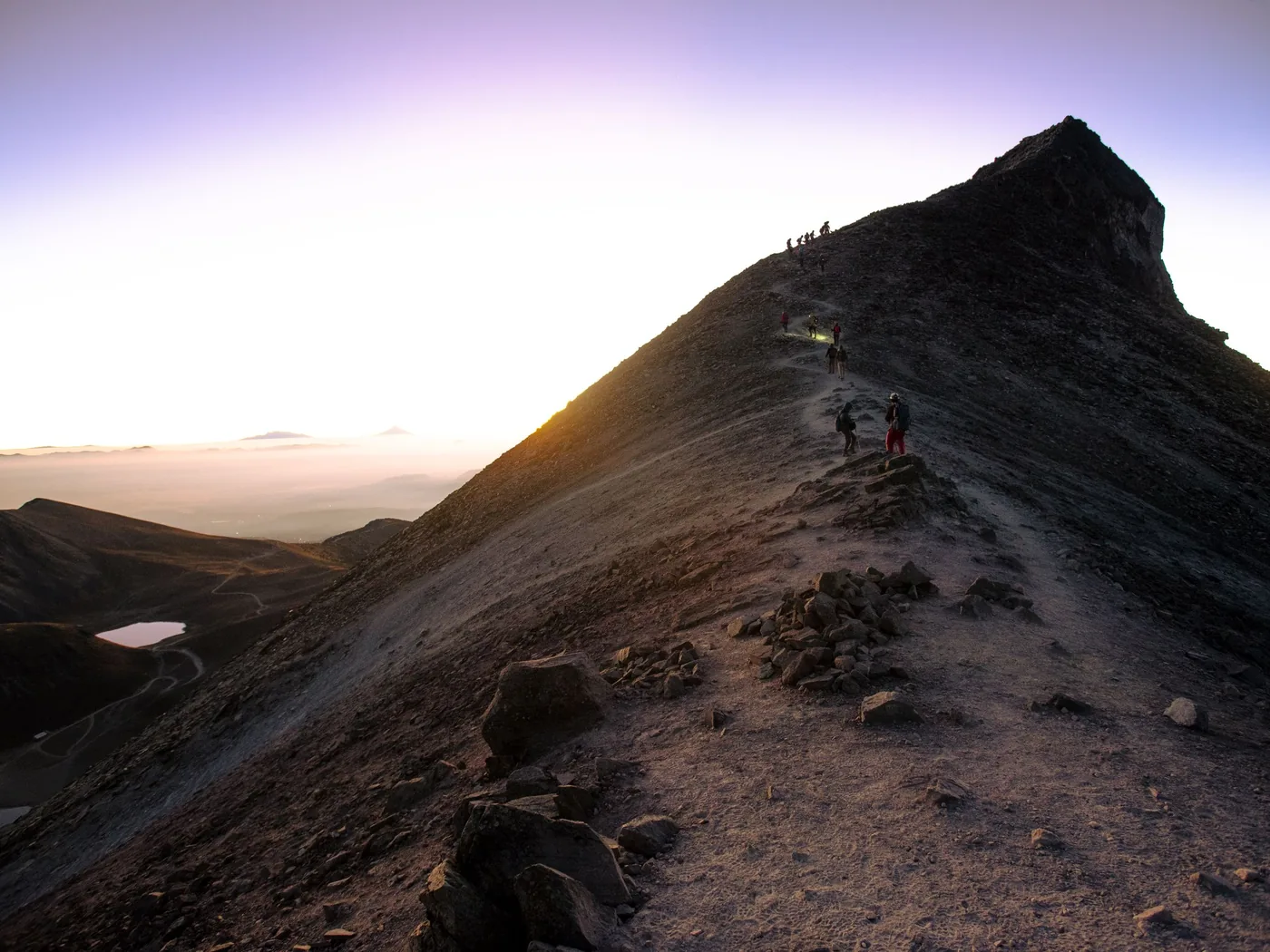 Hikers near the summit viewpoint on Pacaya volcano